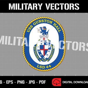 May include: A blue and gold circular emblem with the text "USS GUNSTON HALL" and "DEFENDING THE CONSTITUTION" around a crest with a lion and a cross. The text "LSD 44" is at the bottom of the emblem.