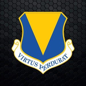May include: A blue and yellow shield with a white scroll at the bottom. The scroll reads "Virtus Perdurat".