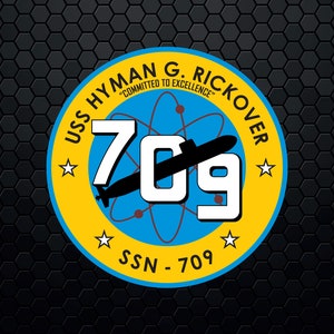 May include: A yellow and blue circular emblem with a white star on each side. The emblem features the text "USS HYMAN G. RICKOVER" with the text "COMMITTED TO EXCELLENCE" in smaller font. The number "709" is in large white font with a black submarine silhouette over the "0". The text "SSN - 709" is at the bottom of the emblem.