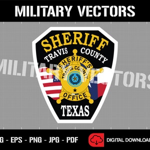 May include: A black and gold sheriff's badge with the text "Sheriff Travis County" and "Sheriff's Travis County Office Texas". The badge features a five-pointed star with a blue center and a wreath of laurel leaves. The badge is surrounded by a red, white, and blue American flag and a blue, white, and red Texas flag.