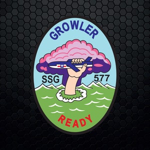 May include: A green, white, and blue circular patch with the words "Growler", "SSG", "577", and "Ready" in black lettering. A cartoon hand holding a plane is emerging from a pink cloud.