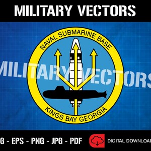 May include: A yellow circle with the text "NAVAL SUBMARINE BASE KINGS BAY GEORGIA" around the edge. Inside the circle is a blue background with a black submarine and a white trident with a missile in the center.
