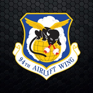 May include: A blue and white emblem with a black panther on a globe, surrounded by clouds. The text "94th Airlift Wing" is written on the emblem.