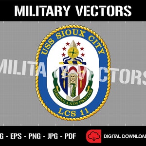 May include: A blue and gold circular emblem with a rope border. The emblem features the text "USS SIOUX CITY" and "LCS 11". Inside the circle is a crest with a Native American warrior, a sword, and the text "FORGING A NEW FRONTIER".