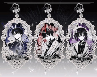 May include: Three decorative acrylic charms featuring anime-style illustrations. Each charm has a unique design with a character portrait, text, and ornate frame. The text includes "The Protagonist", "The Reader", and "The Writer".