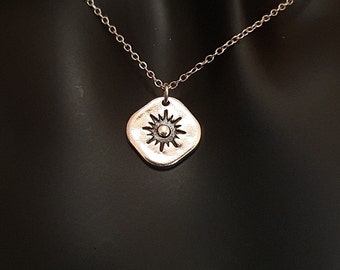 Ecofriendly Sun Pendant. Handmade from Recycled Fine Silver.