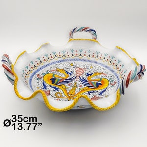 Coupe à fruits – Centre de table à décor raphaélique avec trois anses tressées, 35 cm. Céramique artistique de Deruta peinte à la main. Fabriqué en Italie.