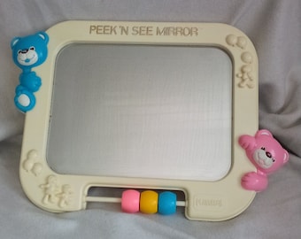 Crib mirror top
