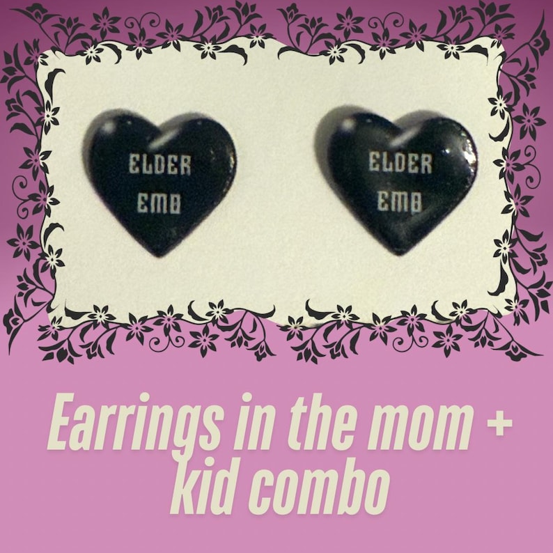 May include: A pair of black heart-shaped earrings with the text "ELDER EMO" printed on them. Earrings in the mom + kid combo.