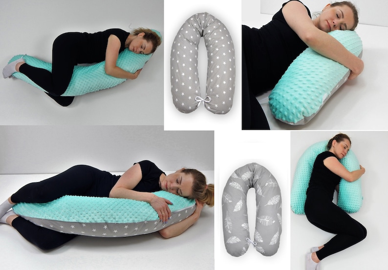 May include: A U-shaped pregnancy pillow with a gray and white star pattern on one side and a light blue and white textured pattern on the other side. The pillow is shown in different positions with people sleeping on it.