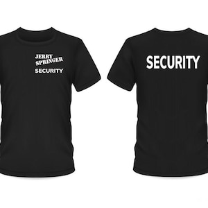 May include: Two black t-shirts, one with "JERRY SPRINGER SECURITY" printed on the front and the other with "SECURITY" printed on the back.