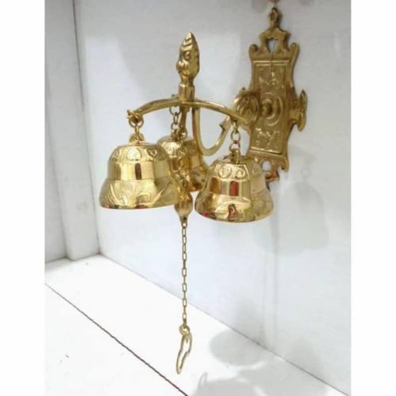 Wall-mounted vintage brass door bell
Solid brass door chime
Brass door bell gift for birthday
Brass wind chime door decoration
Vintage brass door bell for shop
Brass door bell for entryway
Solid brass wall-mounted door bell
Brass wind chime bell door
