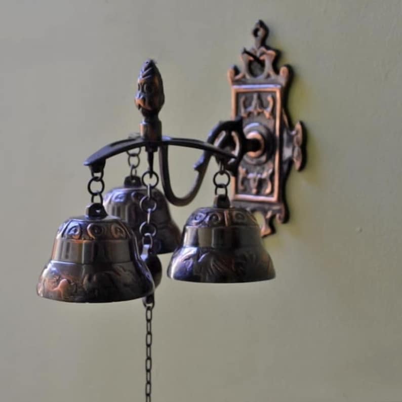 Vintage solid brass wall-mounted hanging bells
Wind chime shopkeepers bell
Brass door bell for front door
Vintage brass door bell for home decoration
Brass wind chime door bell
Shopkeepers brass bell for door
Solid brass hanging bells