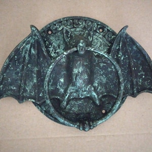 Gothic Home Door Knocker
Bat Wing Design Handle
Artisan Bat Wing Knocker
Bat Wing Door Pull
Distinctive Bat Door Pull Handle
Spooky Bat Door Knocker
Bat Wing Door Knocker Set
Artistic Gothic Door Pull
Bat Wing Decorative Handle