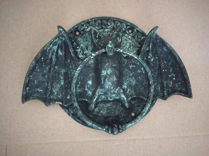 Gothic Home Door Knocker
Bat Wing Design Handle
Artisan Bat Wing Knocker
Bat Wing Door Pull
Distinctive Bat Door Pull Handle
Spooky Bat Door Knocker
Bat Wing Door Knocker Set
Artistic Gothic Door Pull
Bat Wing Decorative Handle