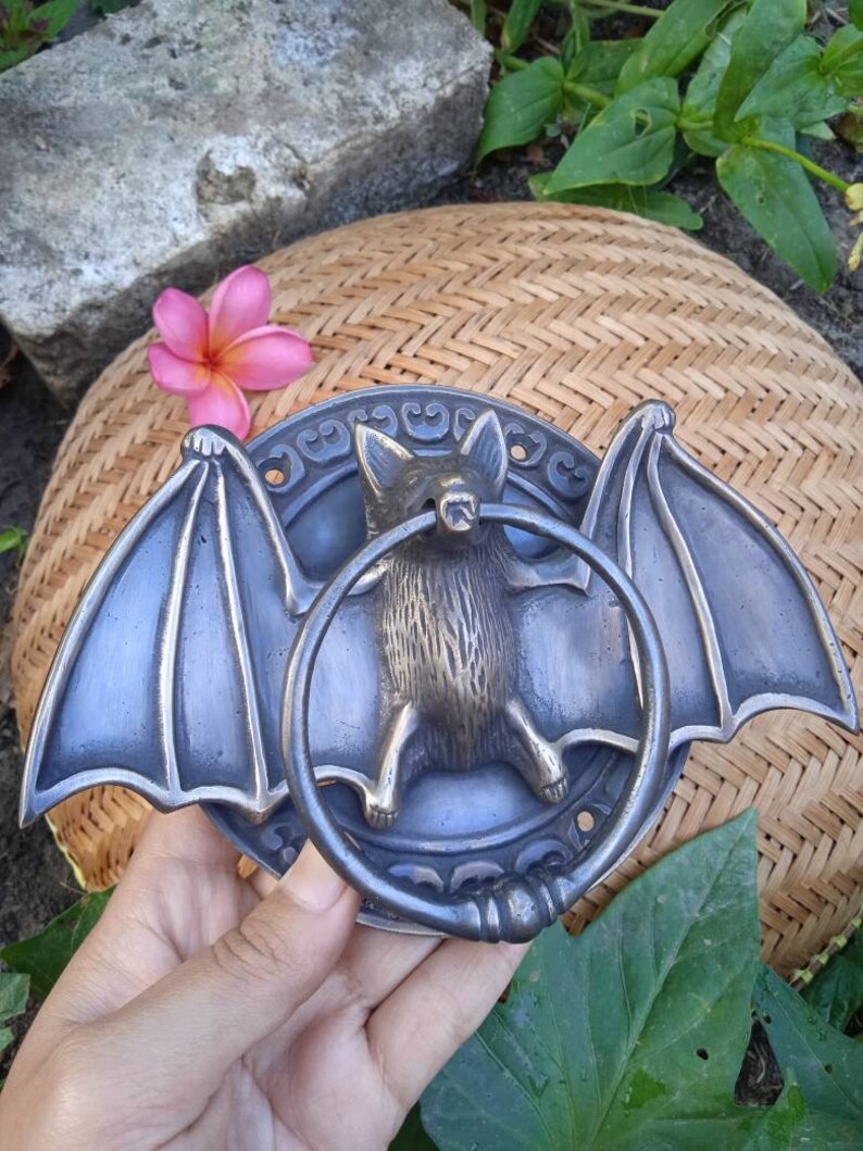 Bat wings door knocker
Halloween door decor
Gothic door knocker
Bat-shaped knocker
Decorative door pull
Unique door handle
Vintage bat door knocker
Spooky house decor, Bat wings handle
Halloween gift idea
Christmas door knocker gift
Birthday gift