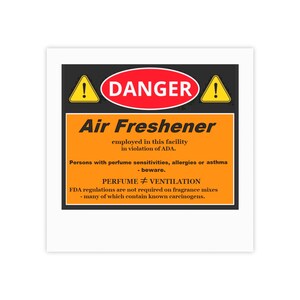 May include: A black and orange warning sign with a red exclamation point on each side. The sign reads "DANGER Air Freshener employed in this facility in violation of ADA. Persons with perfume sensitivities, allergies or asthma - beware. PERFUME ≠ VENTILATION FDA regulations are not required on fragrance mixes - many of which contain known carcinogens."