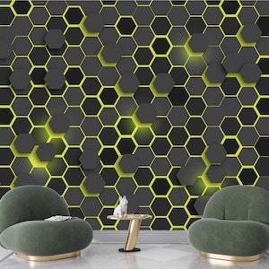 Papel tapiz mural con diseño abstracto de formas hexagonales en amarillo y negro, con impresión autoadhesiva, ideal para decorar paredes y habitaciones.