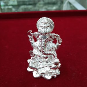 Pure Silver Solid Ganesh Idol on Flower for Pooja, Return Gifts, Vastu Graha Pravesh Gifts for Friend or Family