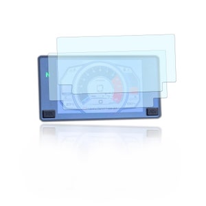May include: A digital gauge with a blue frame, displaying readings on a circular dial. The screen is covered by three transparent protective films. The gauge has buttons labelled "SEL" and "ADJ".
