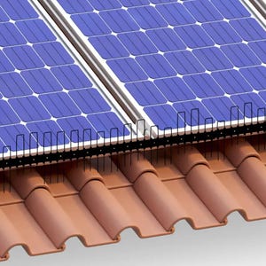 May include: Close-up of solar panels installed on a terracotta tile roof. The panels are secured with metal brackets and a black wire mesh.