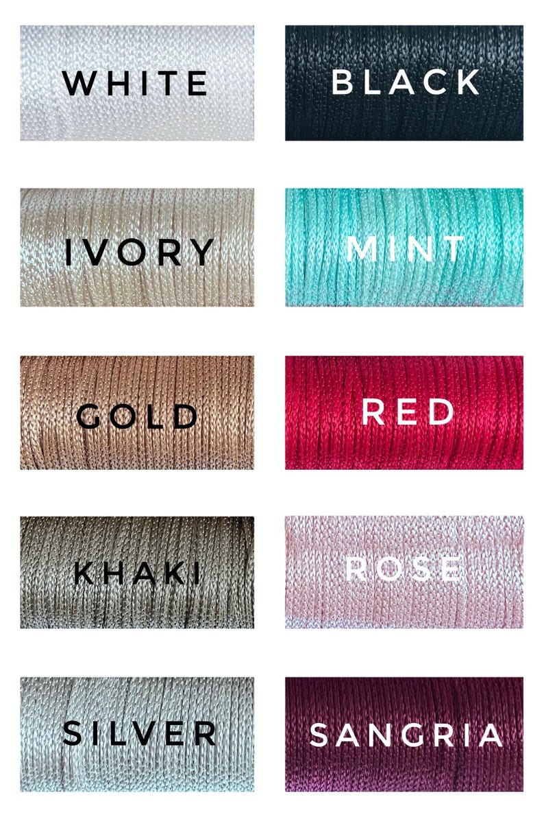 May include: A collection of 10 spools of embroidery floss in various colors, including white, black, ivory, mint, gold, red, khaki, rose, silver, and sangria.