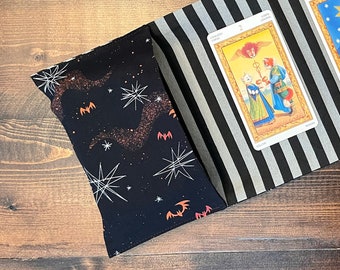 Tarot Wrap Bag Pouch - black with orange bats and white stars, striped gray interior, witchy, mystical, black ribbon tie