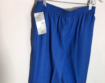 May include: Blue pants with an elastic waistband and a tag that says "La Mode" size 16.