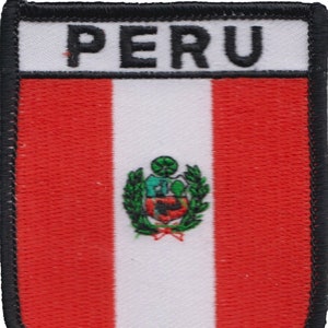 May include: A red, white, and red embroidered patch with the word "PERU" in black lettering at the top and the Peruvian coat of arms in the center. The patch has a black border.