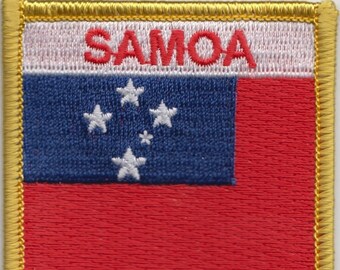 May include: An embroidered patch featuring the flag of Samoa. The patch is red with a white top section containing the word "SAMOA" in red lettering. The blue section below features five white stars. The patch is edged with a gold border.