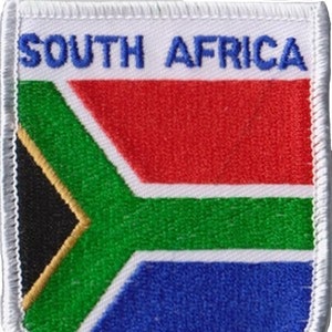 May include: A white patch with the words "SOUTH AFRICA" in blue lettering above the South African flag. The flag features a red, white, green, black, and blue color scheme.