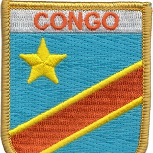 May include: Embroidered patch with the flag of the Democratic Republic of the Congo. The patch is blue with a diagonal orange stripe and a yellow star. The word "CONGO" is embroidered in orange on a white background at the top of the patch.