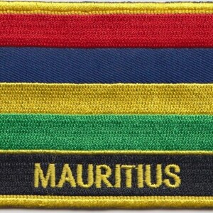 May include: A red, blue, yellow and green horizontal striped patch with the word "MAURITIUS" in yellow lettering on a black background.