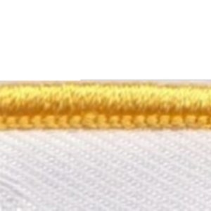 May include: A close-up of a white fabric with a yellow stitched border.