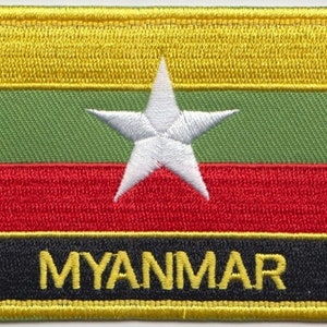 May include: A yellow, green, red, and black embroidered patch with a white star and the word "MYANMAR" in yellow.