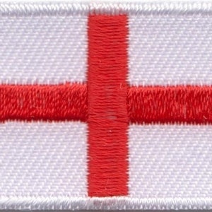 May include: A white embroidered patch with a red cross, representing the flag of England.