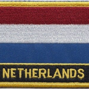 May include: An embroidered patch featuring the Dutch flag in red, white, and blue, with a gold border and the word "NETHERLANDS" in gold lettering on a black background.