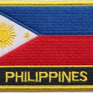 May include: Embroidered patch featuring the flag of the Philippines. The design includes a white triangle with a yellow sun and three stars, a blue field, and a red field. The word "PHILIPPINES" is embroidered in yellow.