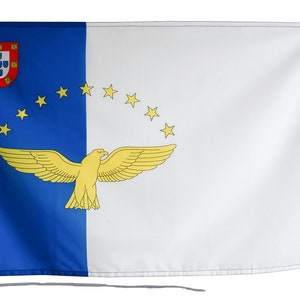 May include: A blue and white flag with a yellow eagle and stars. The flag is the national flag of Cape Verde.