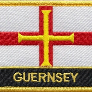 May include: A white patch with a red cross and a yellow cross on top. The patch has a black border with the word "GUERNSEY" in yellow letters.