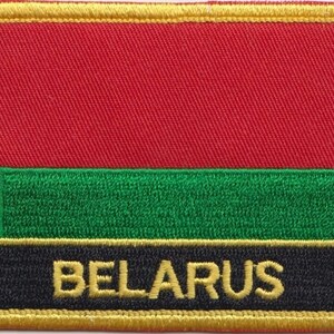 May include: Embroidered patch featuring the flag of Belarus. The flag is red with a white and green pattern on the left side and a green stripe at the bottom. The word "BELARUS" is written in gold on a black background.