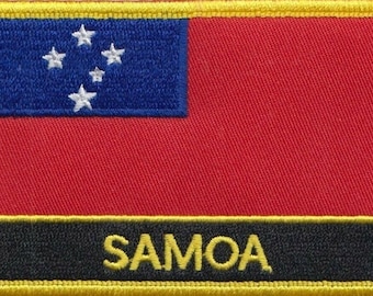 May include: An embroidered patch featuring a red and blue design with five white stars and the word "SAMOA" in yellow lettering on a black background. The patch is edged with a yellow border.