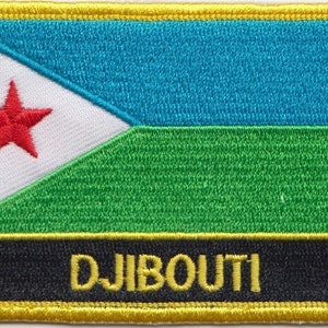 May include: A fabric patch featuring the flag of Djibouti. The flag is blue, green and white with a red star. The text "DJIBOUTI" is written in yellow on a black background.