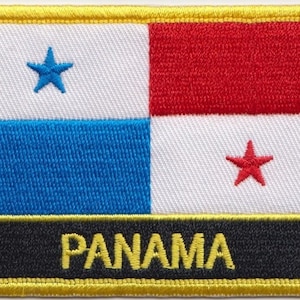May include: A rectangular embroidered patch with the flag of Panama. The flag features a blue star on a white background, a blue stripe, a white stripe, and a red stripe. The word "PANAMA" is written in yellow letters on a black background.