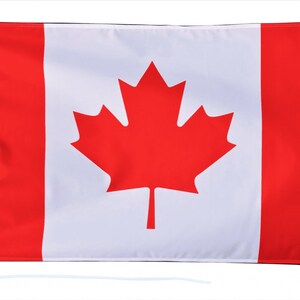 Könnte beinhalten: Eine kanadische Flagge mit einem roten Ahornblatt auf weißem Hintergrund. Die Flagge ist rot und weiß mit einem roten Ahornblatt in der Mitte.