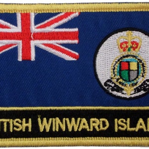 May include: A blue patch with a gold border and the text "BRITISH WINWARD ISLANDS". The patch features a Union Jack flag and a crest with a crown and a shield.