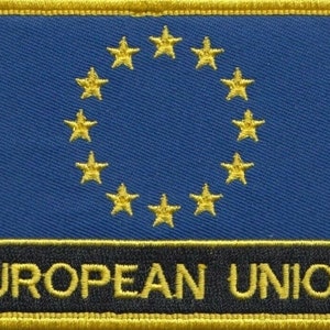 May include: A blue patch with a circle of 12 gold stars and the text "EUROPEAN UNION" in gold letters on a black background.