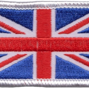 May include: A white embroidered patch with the Union Jack flag design. The flag features red and blue colors.