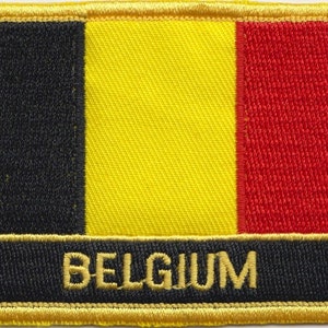 May include: An embroidered patch featuring the Belgian flag in black, yellow and red with the word "BELGIUM" in gold lettering.