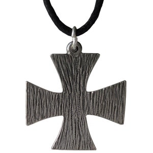 May include: A silver cross pendant with a textured surface, hanging from a black cord.